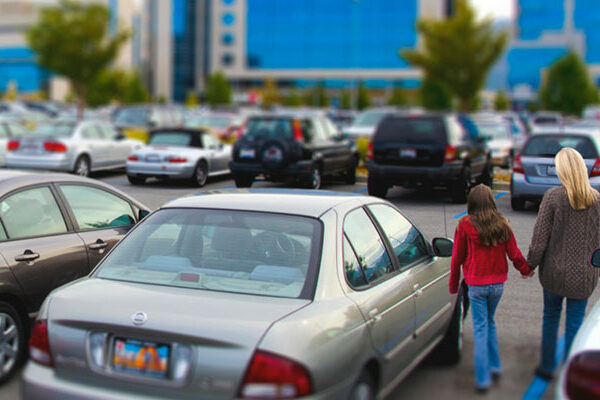 hospitalparkinglot Woman and child in hospital parking lot