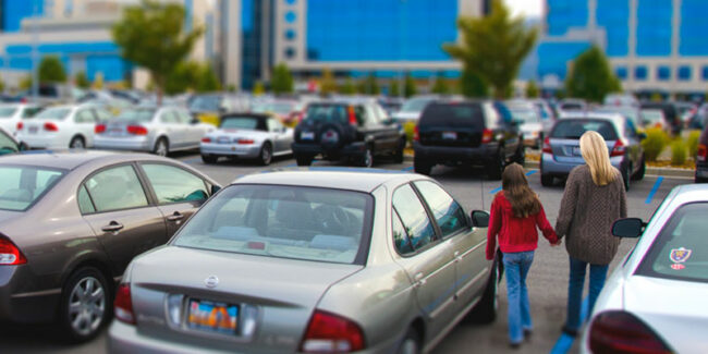 hospitalparkinglot Woman and child in hospital parking lot